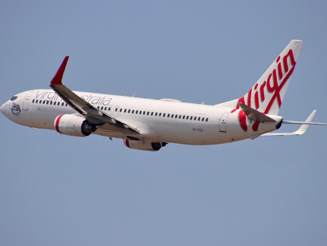 A Virgin Australia plane departing from Brisbane Airport Picture: David Clark.