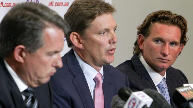 Ian Robson David Evans and James Hird front the media.