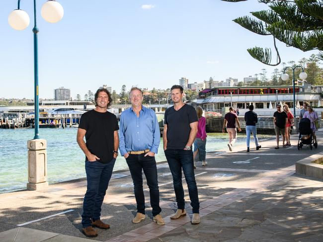 Founders of the Artemus Group, which has taken over Manly Wharf, Adam Flaskas (left) and Paul Henry (centre), with their CEO Luke Fraser, in Manly last month.