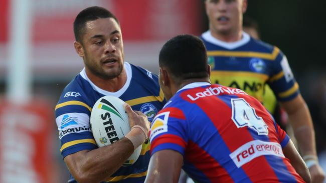 Jarryd Hayne of the Eels about to be tackled.