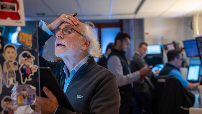 Traders work on the floor of the New York Stock Exchange. Picture: AFP