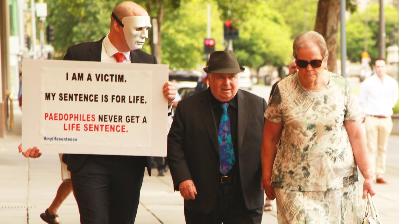 The first masked confrontation between Brother “B” and Vivian Frederick Deboo, centre, in November last year.
