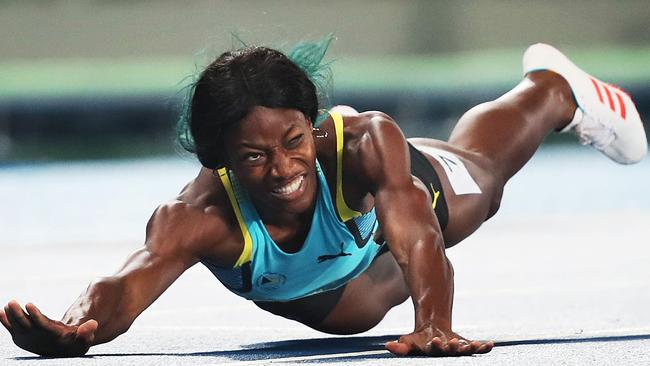 Shaunae Miller of the Bahamas makes a desperate dive for Gold in the Women's 400m Final just beating American Allyson Felix during the Athletics at the Olympic Stadium on Day 10 of the Rio 2016 Olympic Games. Picture. Phil Hillyard