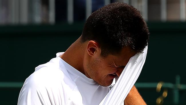 Tomic docked prizemoney after Wimbledon shocker