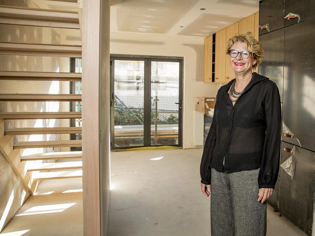 Architect Amy Degenhart pictured inside one of the ENVI Micro Urban Village homes while it was under construction. Picture: Jerad Williams.