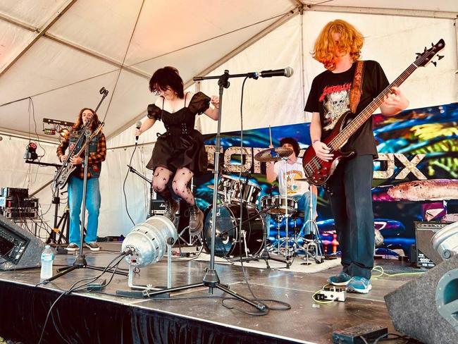 Bowen band Gleezus performing at Townsville Folk Festival. L-R: Guitarist Jack Homewood, vocalist Kameron Stoneham, bassist Ashton Shepherd, and drummer Brock Medhurst. Photo: Contributed