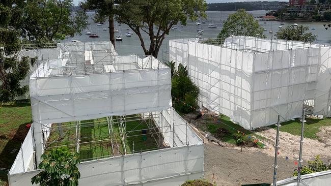 The white sheeted scaffolding erected to highlight Scott Farquhar’s concern about any reversion to the multi-dwelling subdivision concept.