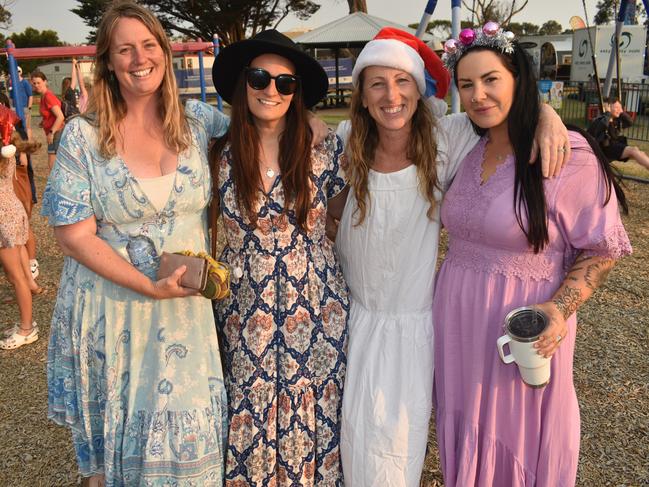 Lauren Masterson, Shar Joyner, Shelley Gray and Holly Shearer at the San Remo Christmas Carols at the foreshore on Friday, December 20, 2024. Picture: Jack Colantuono