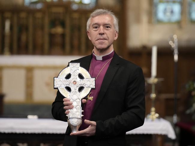 Archbishop of Wales Andrew John with the Cross of Wales at Holy Trinity Church, Llandudno Llandudno, Wales. Picture: Getty Images