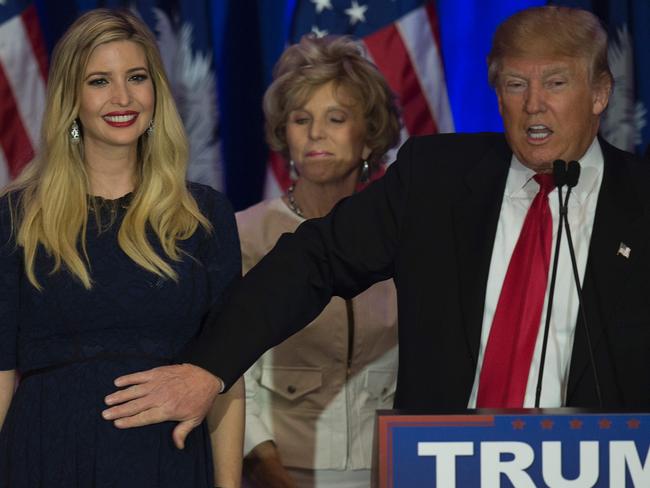 Republican presidential candidate Donald Trump pats his daughter Ivanka Trump baby bump. Picture: AFP/Jim Watson