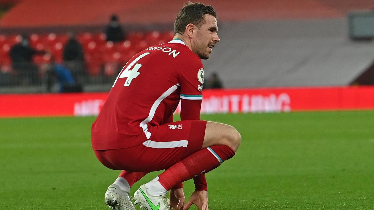 Jordan Henderson came off injured as Liverpool’s defensive curse continued. (Photo by Paul ELLIS / POOL / AFP)