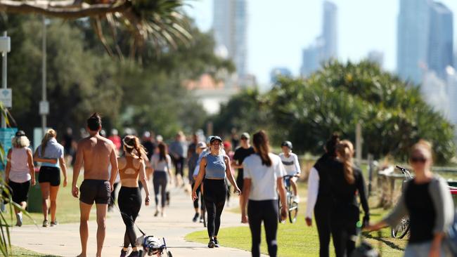 People flocked to Burleigh to soak up the sun and exercise. Picture: Chris Hyde/Getty Images