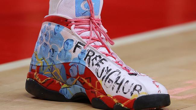 A view of the shoes worn by Enes Kanter, which read “Free Uyghur”. Photo by Kevin C. Cox/Getty Images