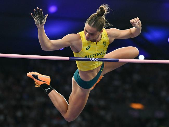 TOPSHOT - Australia's Nina Kennedy competes in the women's pole vault final of the athletics event at the Paris 2024 Olympic Games at Stade de France in Saint-Denis, north of Paris, on August 7, 2024. (Photo by Andrej ISAKOVIC / AFP)