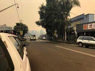 Smoke covers Nimbin: Cullen St. outside the Nimbin's town hall. Picture: Alison Paterson