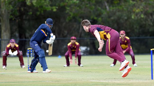 Nick Fletcher bowls to batsman Tom Rogers. Picture: Steve Tanner