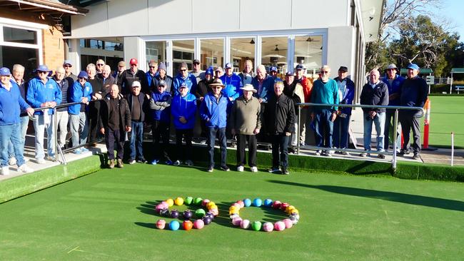 Bowlers at Newcastle's Lowlands Bowling Club celebrating the 90th birthday of member John Orrett (front row, with white, wide-brimmed hat). Picture: Greg Danvers