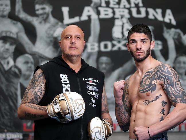 Michael Zerafa with his trainer Sam Labruna in the gym. Picture: Ian Currie