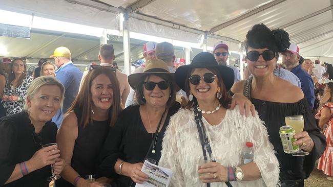 Punters dressed in their finest black and white for Derby Day celebrations in Dubbo. Photo: Tijana Birdjan