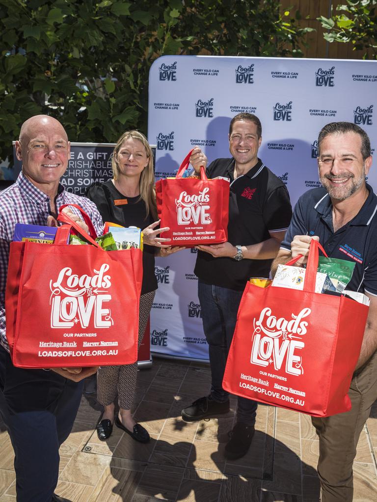 Launching Loads of Love for Christmas 2020 are (from left) Andrew Fox of Heritage Bank, Julie Thompson of Grand Central, Matt Gregg of Lifeline and Gus Romero of Harvey Norman. Picture: Kevin Farmer