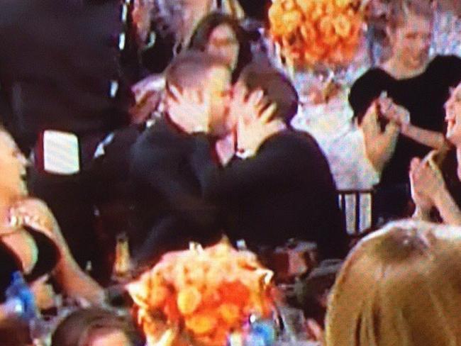 Andrew Garfield kisses Stephen Colbert after kissing Ryan Reynolds ...