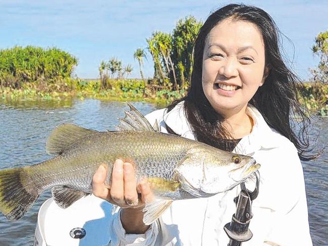 Miyoko Fukaya with a Corroboree “rat” which will be one of so many baby barra to watch as they grow year by year.