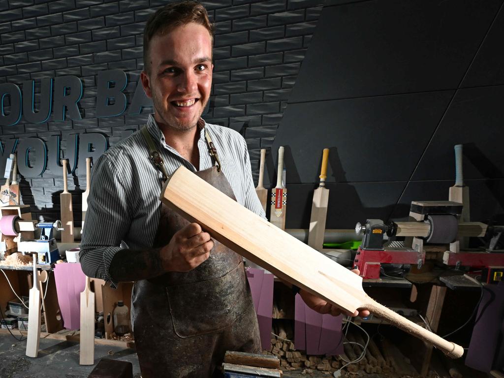 Brisbane Heat’s Josh Brown at Cooper Cricket in Northgate, where he works as a bat maker. Picture: Lyndon Mechielsen