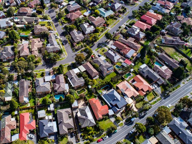 Aerial shot of houses in the outer suburbs of Melbourne.