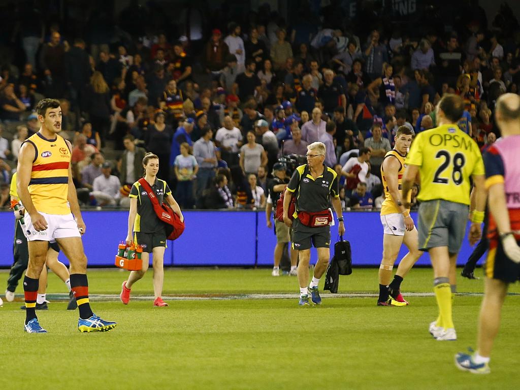 Adelaide’s Taylor Walker talks to the umpire at three quarter time in the game against the Bulldogs in 2016. Picture: Wayne Ludbey
