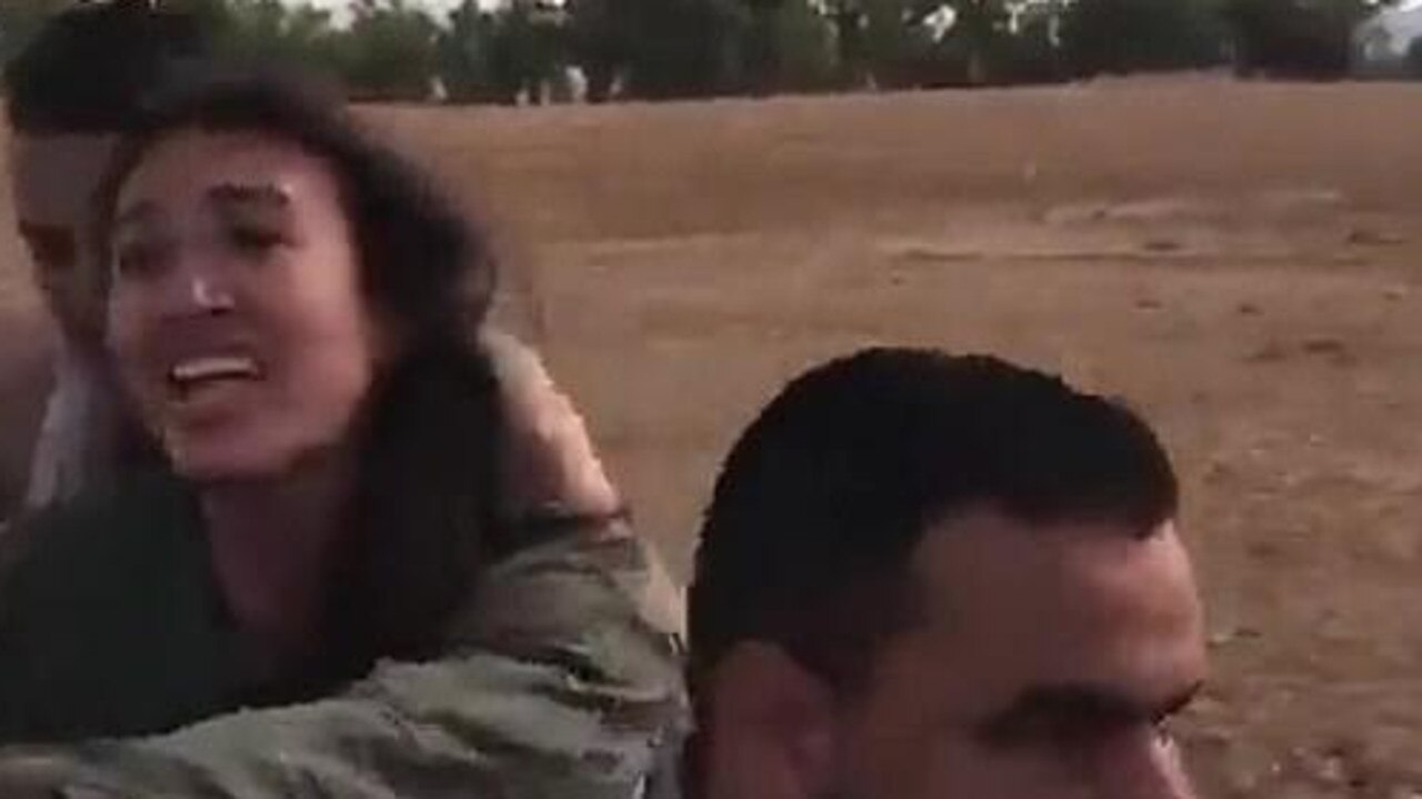 Noa Argamani can be seen screaming for her life as Hamas terrorists cart her away on a motorcycle.