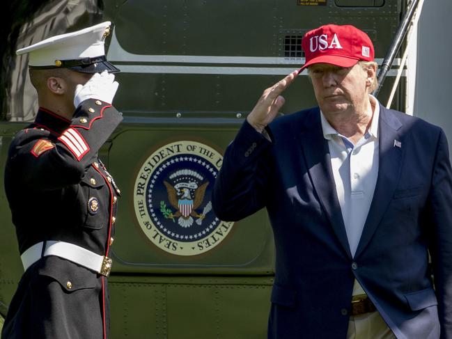 President Donald Trump arrives to the South Lawn of the White House in Washington, Sunday, June 23, 2019, after traveling from Trump National Golf Club in Sterling, Va. (AP Photo/Andrew Harnik)