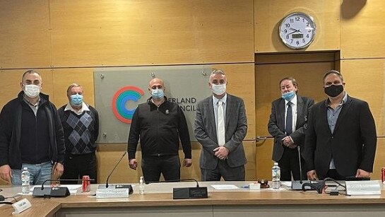 Cumberland Mayor Steve Christou (centre, white mask) in the Cumberland Council chamber at Merrylands on July 21 with Joe Rahme, Greg Cummings, Eddy Sarkis, Paul Garrard and Michael Zaiter. Cr Ned Attie was also at the meeting but not in the photo. Picture: Instagram