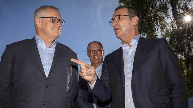 Prime Minister Scott Morrison with former SA premier Steven Marshall in February. Behind is former minister Corey Wingard. Picture Emma Brasier