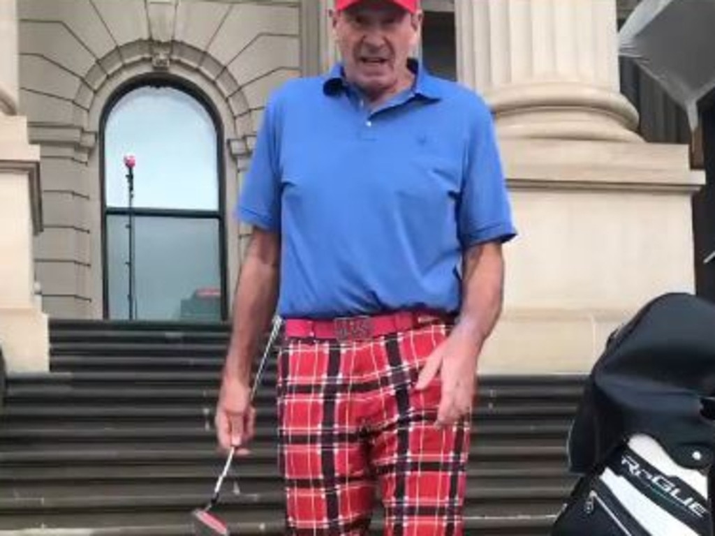 Sam Newman on the steps at Parliament House.