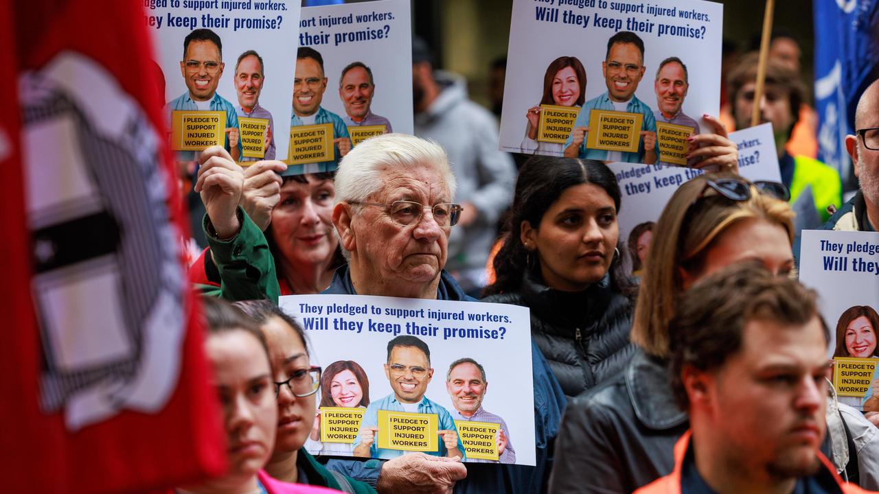 Daily Telegraph. 26, May, 2025. Essential workers from across NSW during a rally outside 52 Martin Place, today, to oppose the government's proposed cuts to workers compensation. Picture: Justin Lloyd.