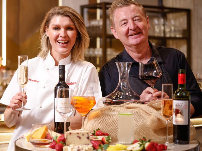 Coles ambassadors Courtney Roulston and Luke Mangan with the Schott Zwiesel 'Pure' Glassware collectables. (Photo by Hanna Lassen/Getty Images for Coles)