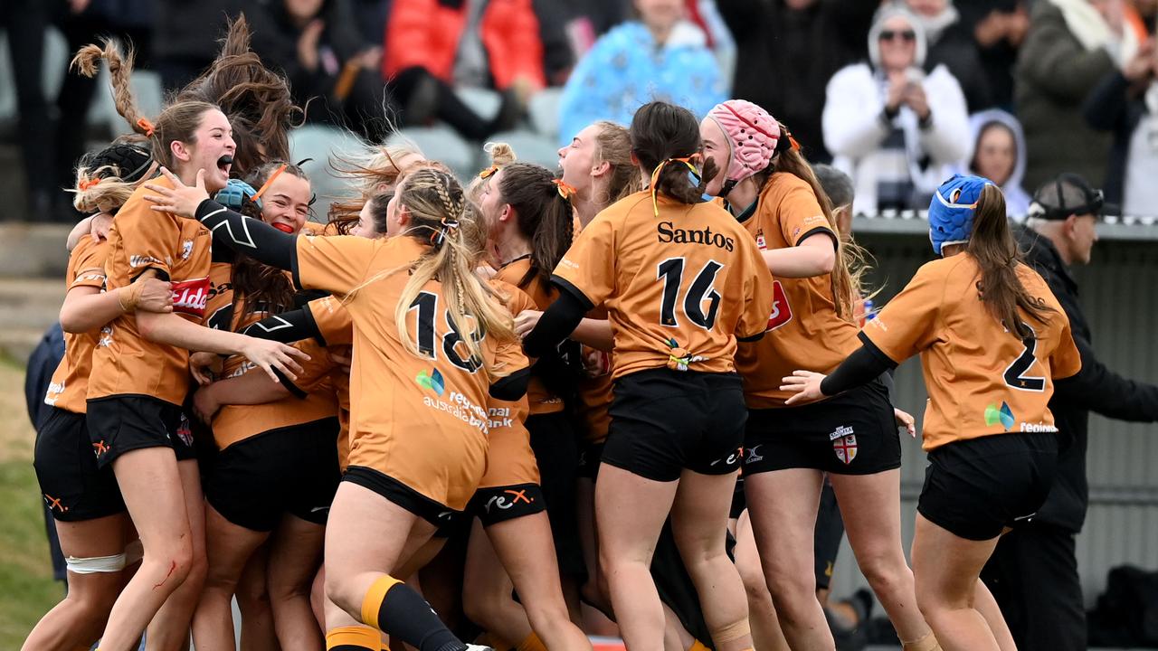 A delighted Country celebrating after their sensational win in the under 18 girls.