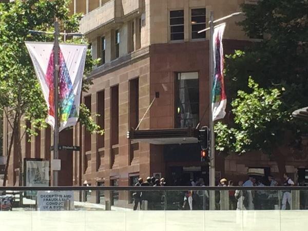 Police gather outside the Lindt cafe. Picture: Frances Mao