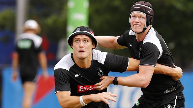 Darcy Moore and Sam McLarty do battle at training. Pic: Michael Klein