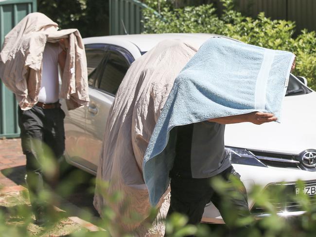 Three people were charged after raids in Sydney yesterday. Picture: Dylan Robinson