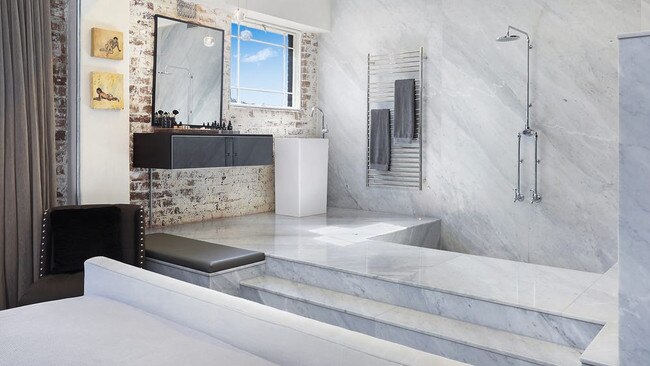 Striking open ensuites are attached to both bedrooms.