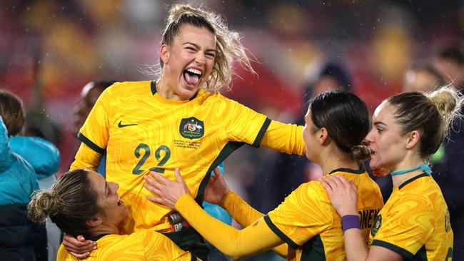 Charlotte Grant celebrates victory with teammates after defeating England during the Women's International Friendly match between England and Australia. Picture: Getty Images