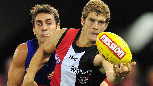 Nick Dal Santo juggles the ball in front of Daniel Giansiracusa.