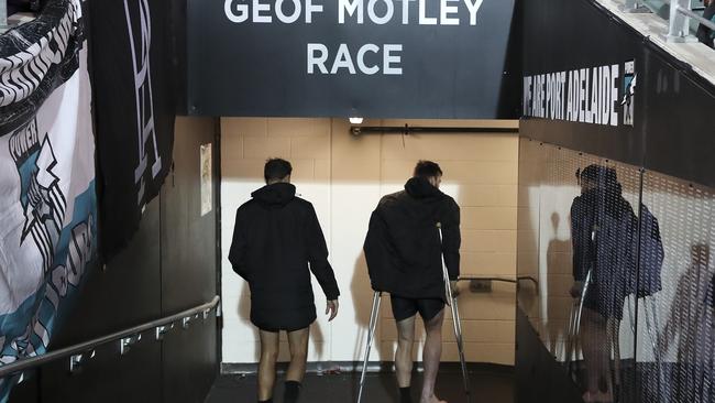 Injured Port Adelaide big men Paddy Ryder and Charlie Dixon walk down the race after the round 21 loss to West Coast. Picture: Sarah Reed