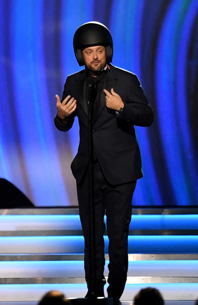 Comedian Nate Bargatze took aim at the Will Smith Oscars slap by wearing a helmet, to protect his face. Picture: AFP