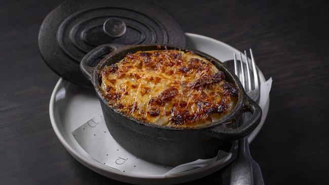 Creamy dreamy: the potatoes Tartiflette is worth every calorie. Picture Wayne Taylor.