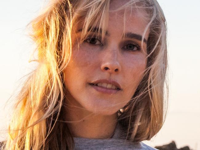 MUST CREDIT SEA SHEPHERD. Former Home & Away actress and activist, Isabel Lucas, protests the Adani Coal Mine at Byron Bay today. She was with a group of Sea Shepherd supporters opposite the mine. Source: Sea Shepherd.