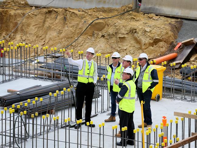 Health Minister Michael Ferguson, left, tours the RHH works. Picture: SAM ROSEWARNE