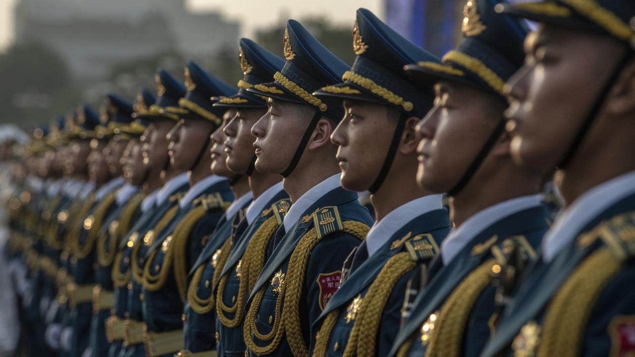 Members of a People's Liberation Army band stand together at a ceremony marking the 100th anniversary of the Communist Party on July 1, 2021. Picture: Kevin Frayer/Getty Images.