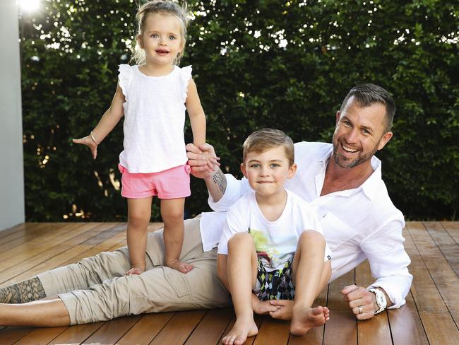 Biggest Loser trainer Shannan Ponton at home with his children, Milla, 2, and Max, 4, in 2017. Picture: Justin Lloyd